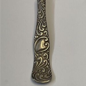 Vintage Holmes & Edwards Silverplate butter spreader.